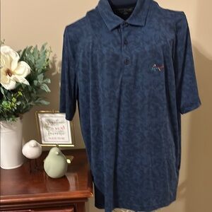Greg Norman Collection Blue Polo Shirt with Classic Design